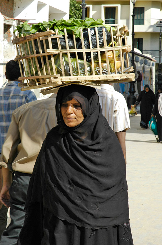  Woman shopping in the souk. 
