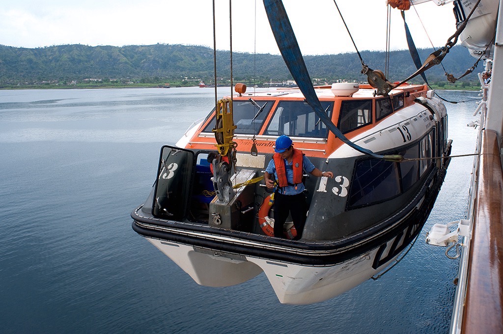  Shore tender being launched, Rabaul, Papua New Guinea. 